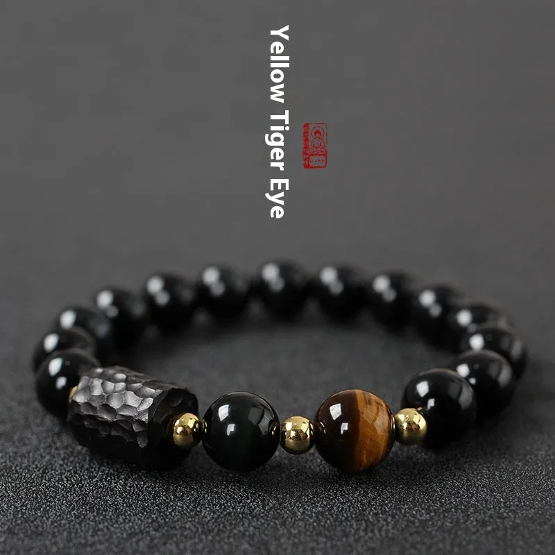 Obsidian bracelet with tiger eye beads in 10mm size showing manual craftsmanship and unisex design
