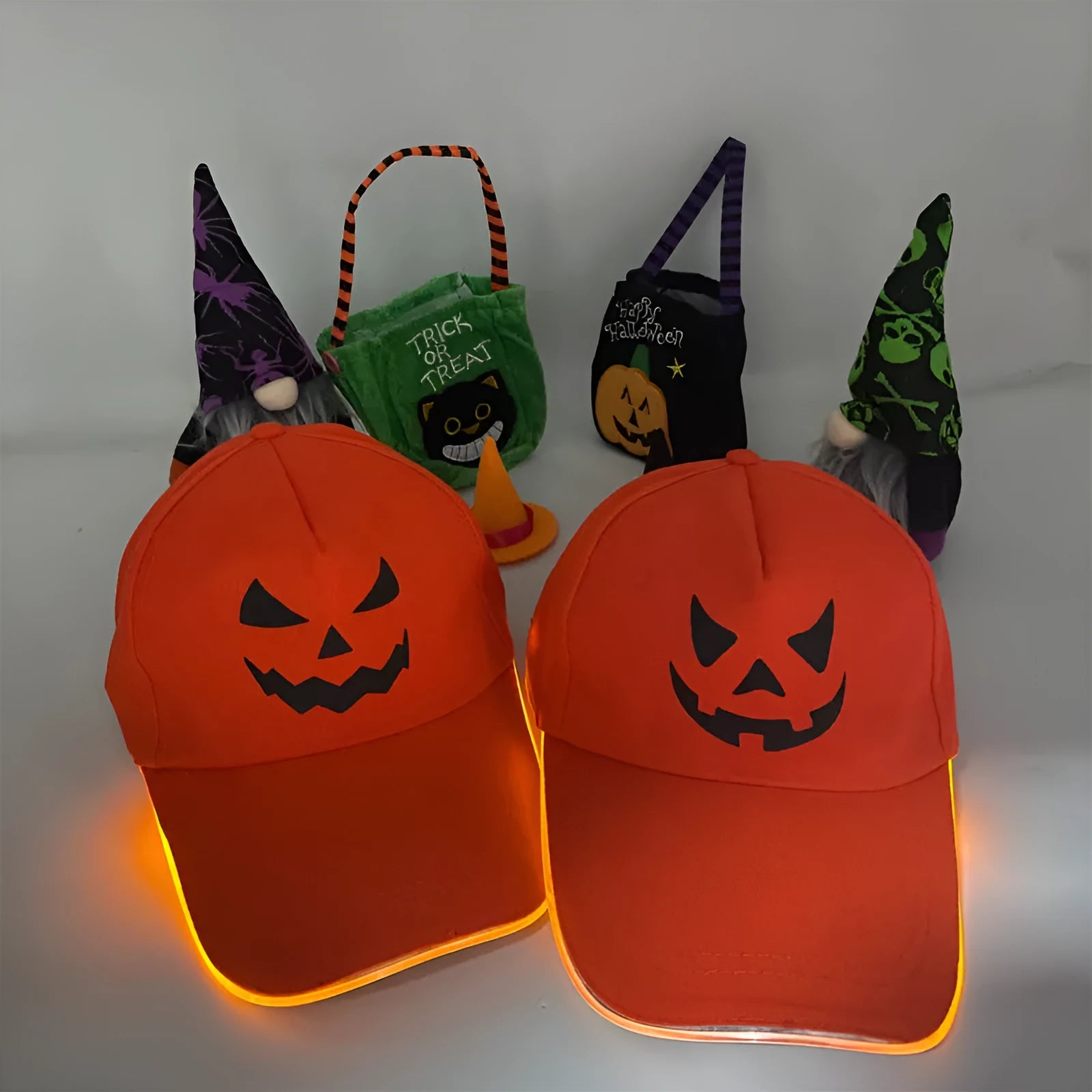 Halloween LED light-up cloth baseball cap showing pumpkin smile yellow light design