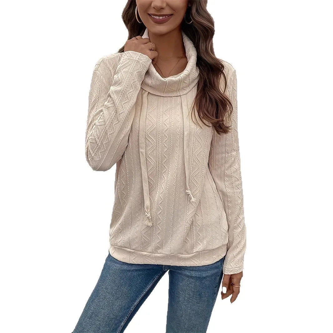 Apricot-coloured women's pullover hoodie with a drawstring hood and long sleeves laid flat.