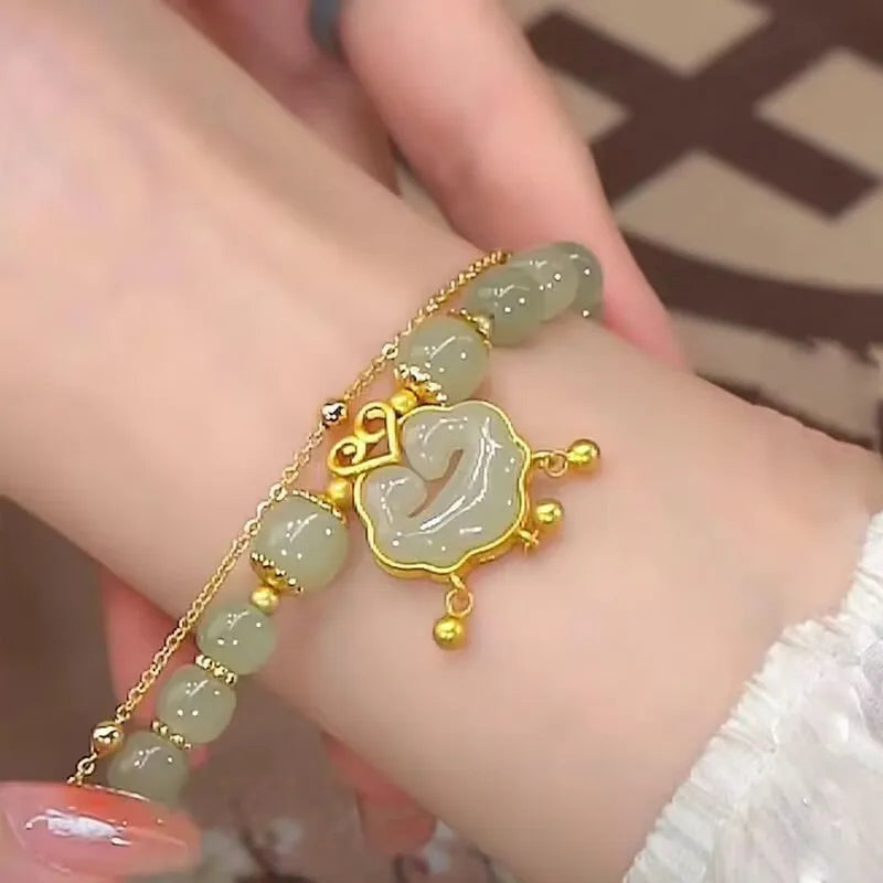 Women's green safety lock bell pendant bracelet with double-layer construction