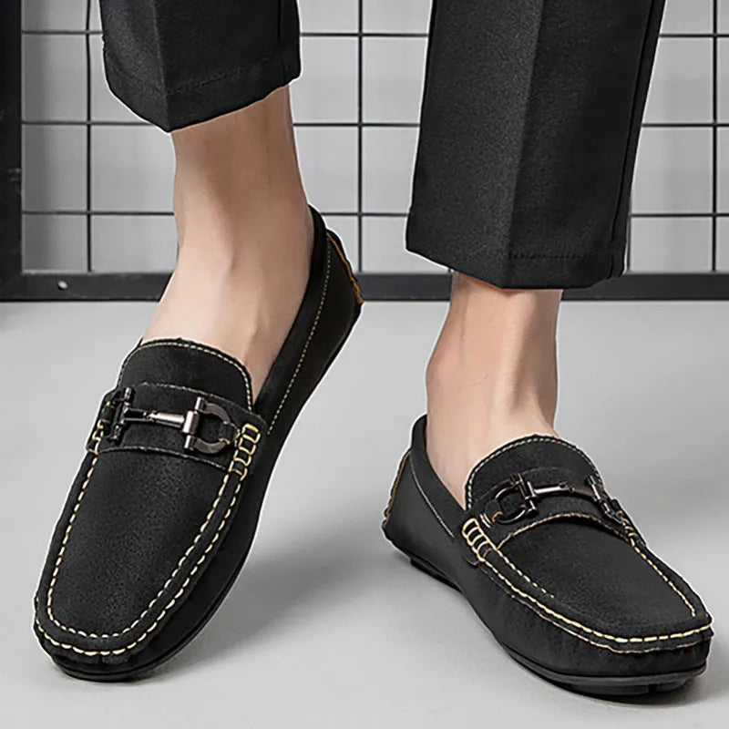 Men's brown casual leather shoes with round toe and rubber sole on a neutral background