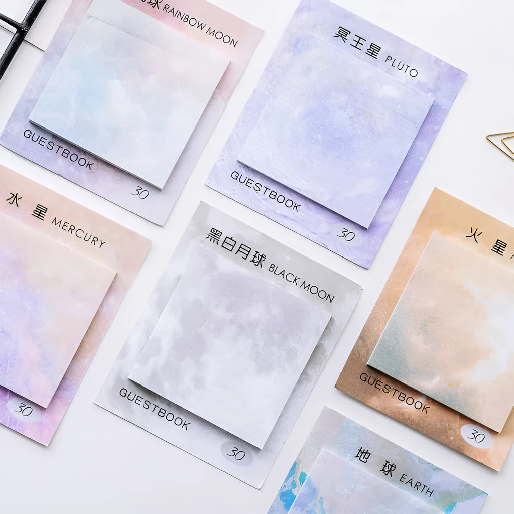 Square planet-themed sticky note notepad showing oil painting designs of moon, earth, and mars.