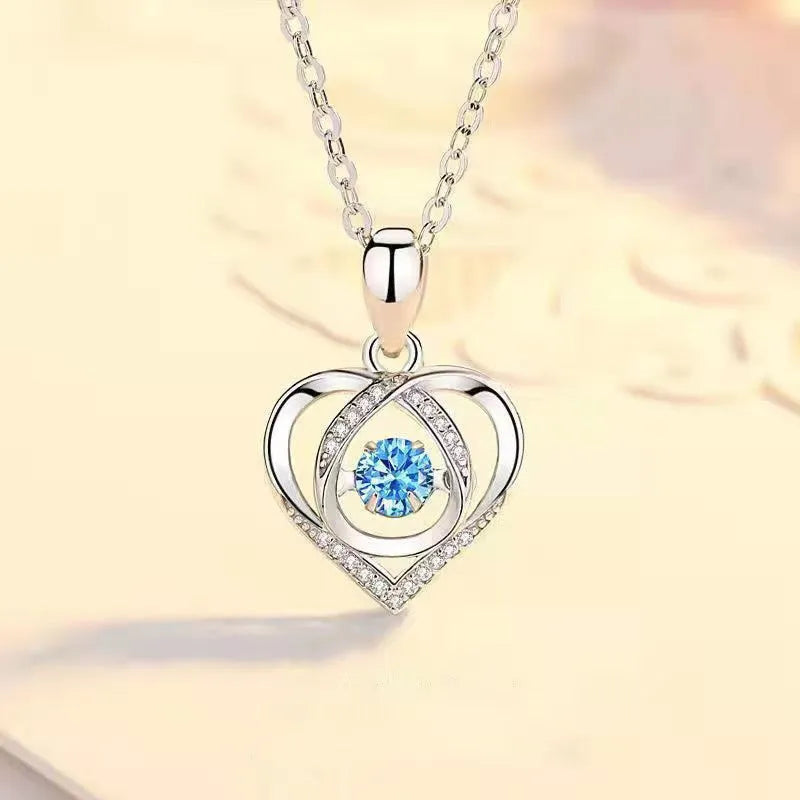 Blue copper necklace and bracelet set with heart-shaped gemstone pendant on a geometry design chain
