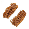 A bag containing many natural coloured, circular rubber bands with a label indicating 500g.