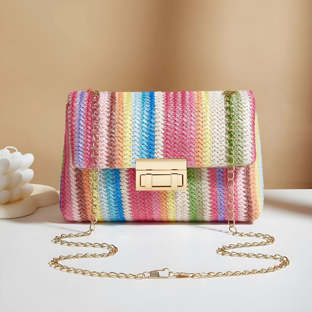 Women's soft straw cross-body bag in square shape with phone pocket, shown in blue colour