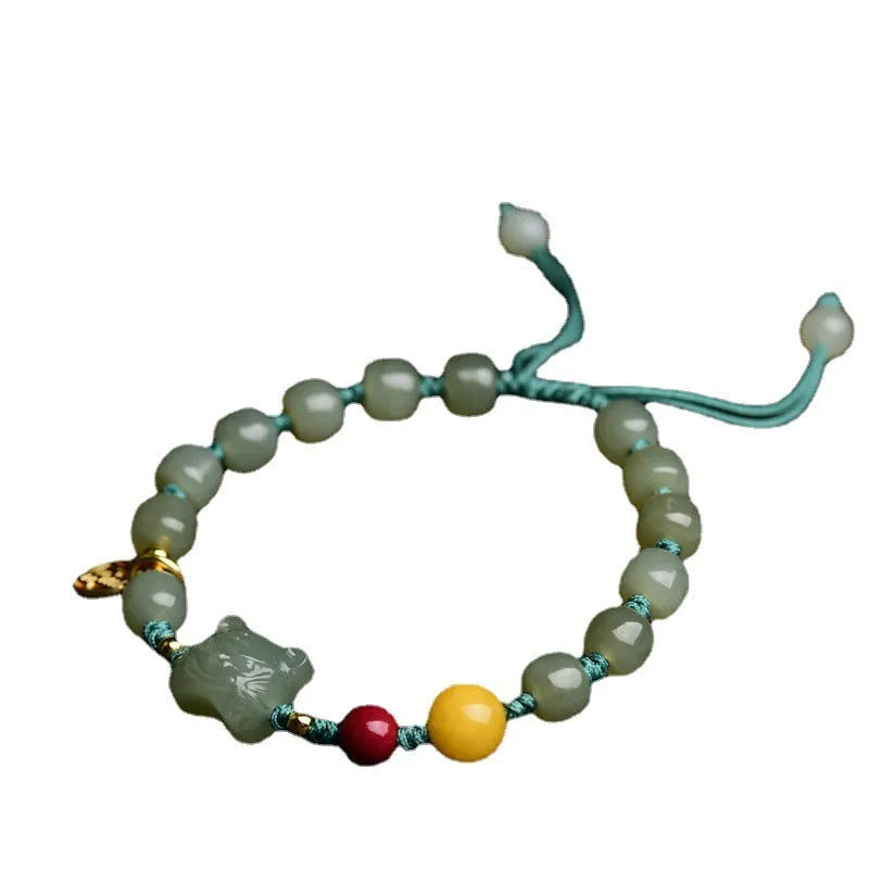 Natural Hetian jade and cinnabar beeswax bead bracelet with 5x7mm beads and Zodiac motifs