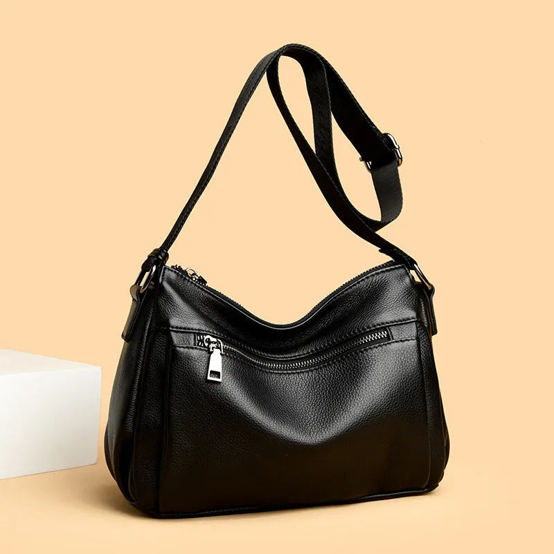 Women's black genuine leather crossbody bag with first layer cowhide, nylon lining, 27x9x22cm, single shoulder strap