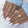 Vintage star and moon 13-piece ring set with opal and rhinestone accents in gold or silver electroplated zinc alloy
