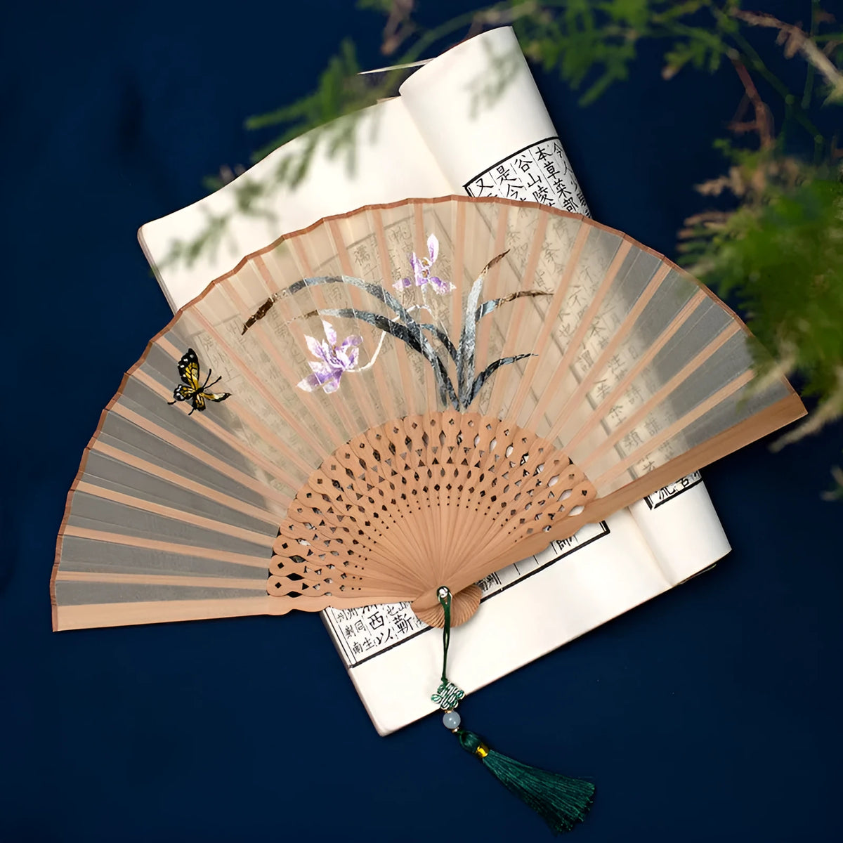 7-inch bamboo folding silk embroidered fan showing traditional Chinese embroidery designs
