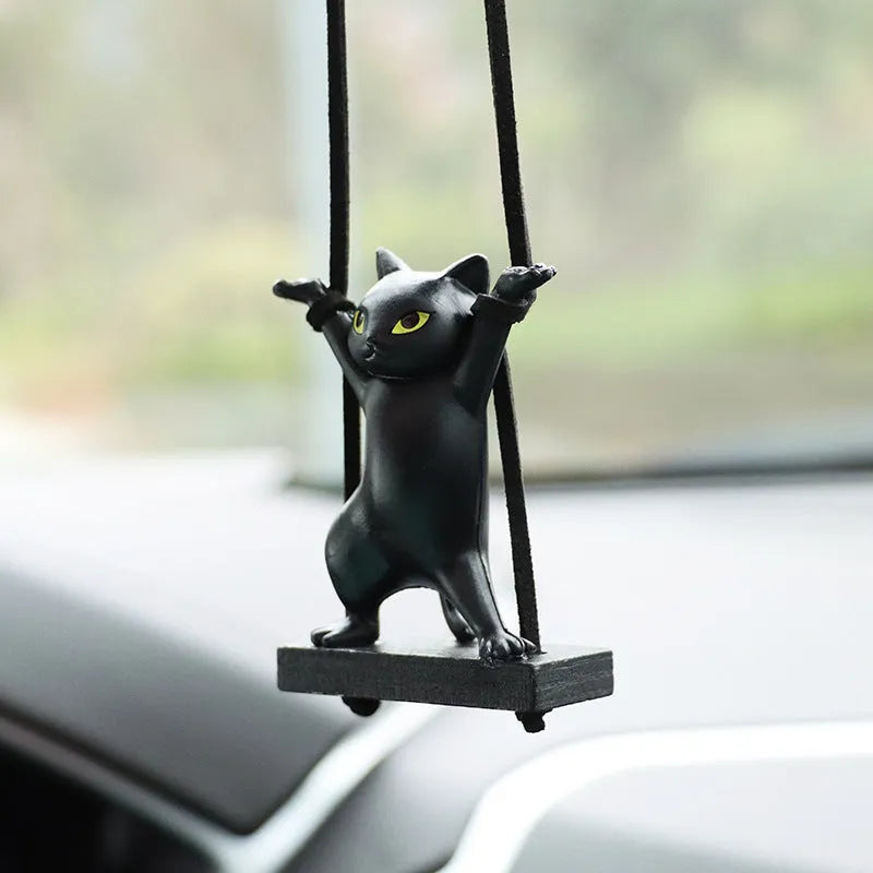 Resin cartoon cat pendant for car interior decoration with adjustable rope, shown in various colours.