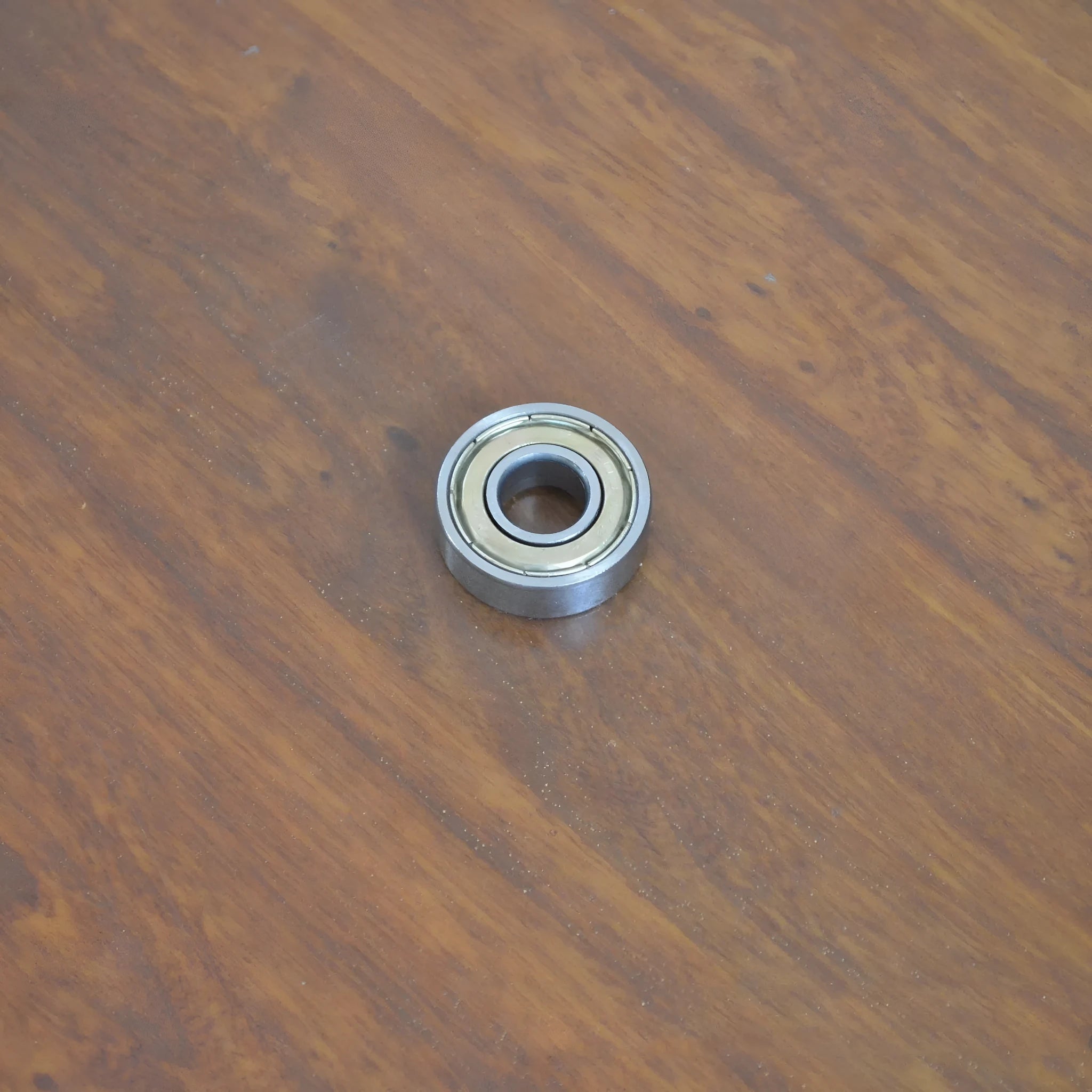 6000ZZ model carbon steel deep groove ball bearing with dimensions 10mm by 26mm by 8mm.