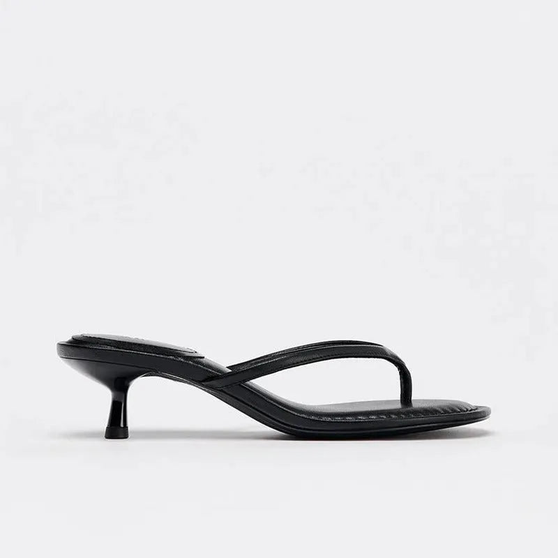 Women's round toe mid-heel summer sandals in black with a flip-flop strap and rubber sole.