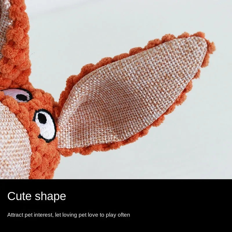 Soft plush dog chew toy in animal shape with internal squeaker for teeth cleaning and play.