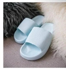 Cozy home slippers with soft fabric uppers and durable EVA soles for comfortable indoor and outdoor wear