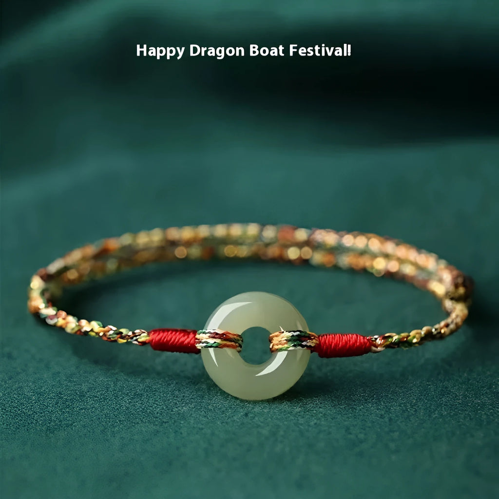 Colourful woven rope bracelet with silver peace buckle clasp on wrist