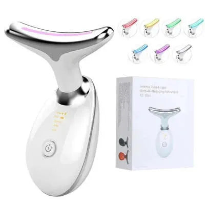 Black and silver EMS thermal neck lifting massager with LED lights on a skincare shelf.