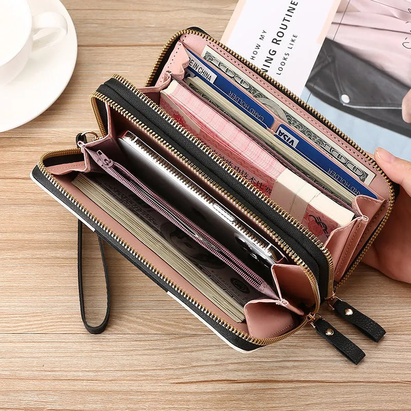 Long PU leather wallet clutch with zip closure and retro print decoration showing internal compartments