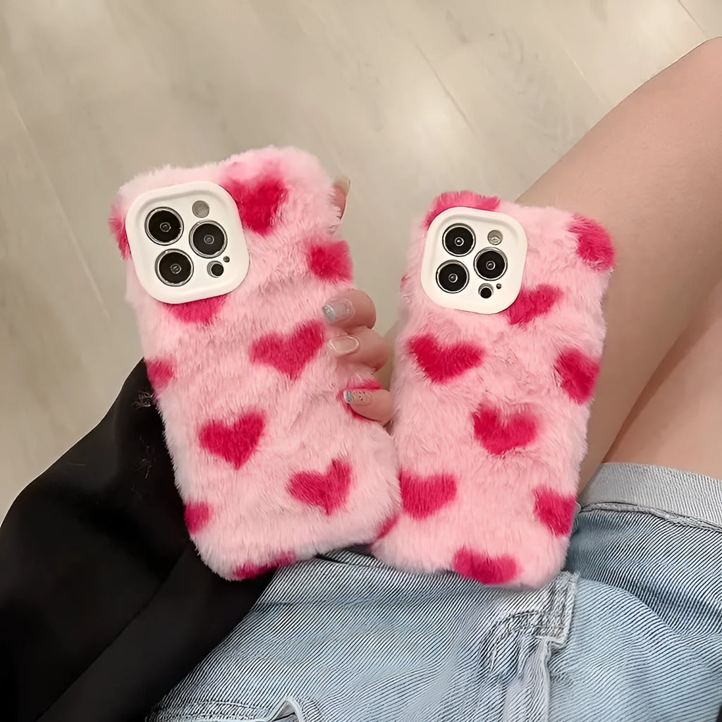 Pink silicone iPhone case with a cartoon design on the back.