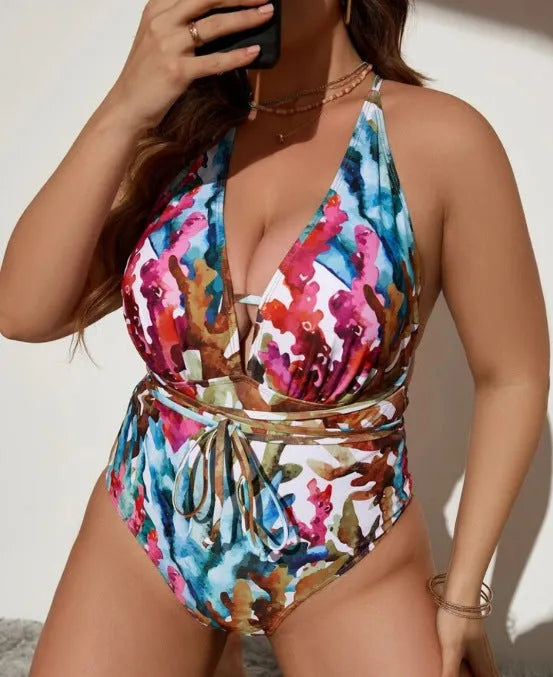 Blue or purple women's one-piece halter swimsuit for swimming sports.