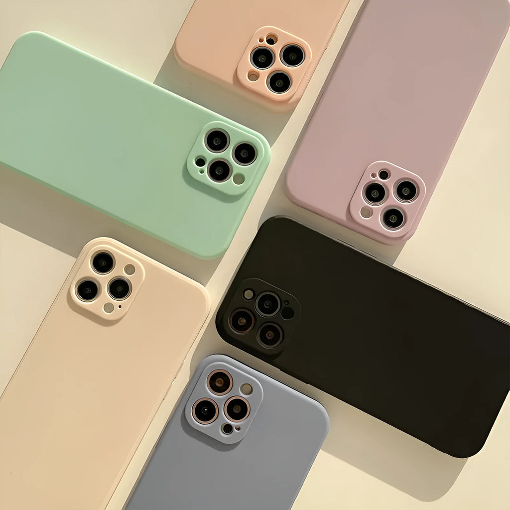 Frosted matte TPU phone back cover case for iPhone 14 in slate blue colour on a table.