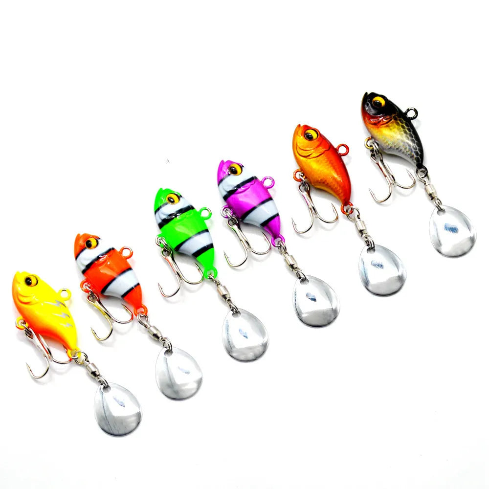 Metal sea fishing iron plate lure with rotating sequins in gold colour variant