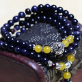 Handmade blue San bead bracelet showing 6mm beads in ethnic style unisex design