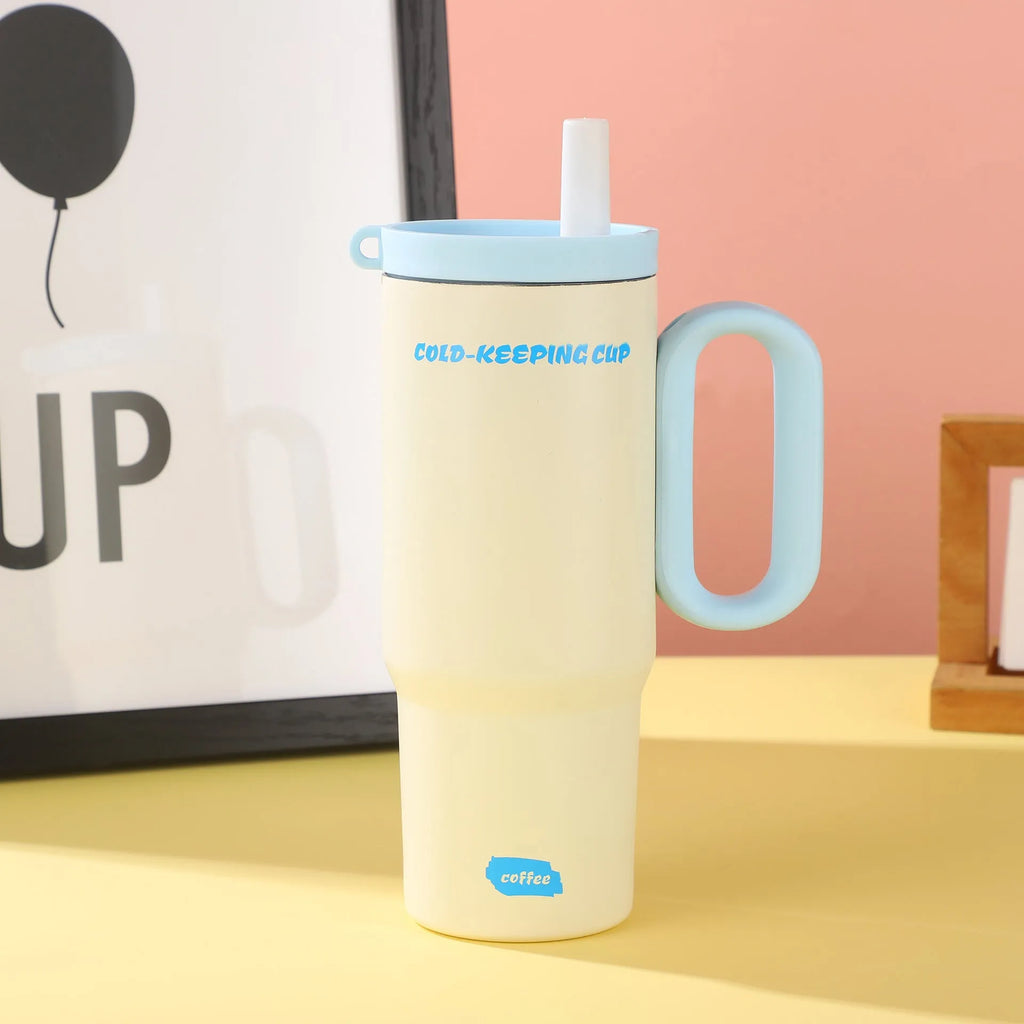 Large insulated portable straw cup with carry handle and straw in multiple colour options.