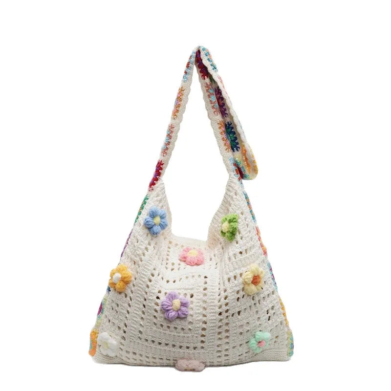 Casual woven hollow beach bag in knitted polyester, shown in milky white with a single shoulder strap.