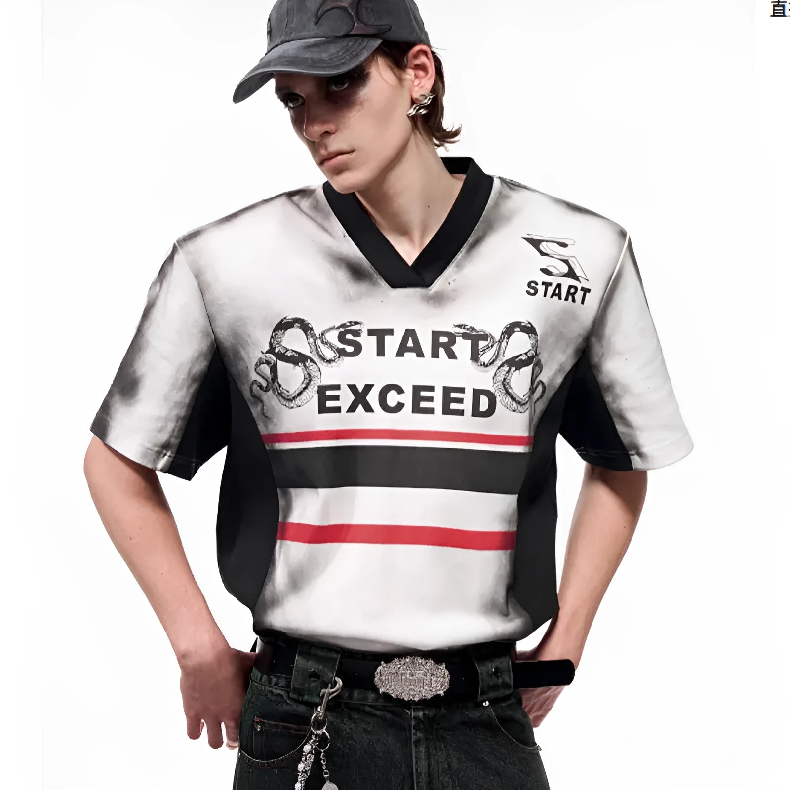 Women's V-neck short sleeve top with black and white letter snake pattern print and padded shoulders.