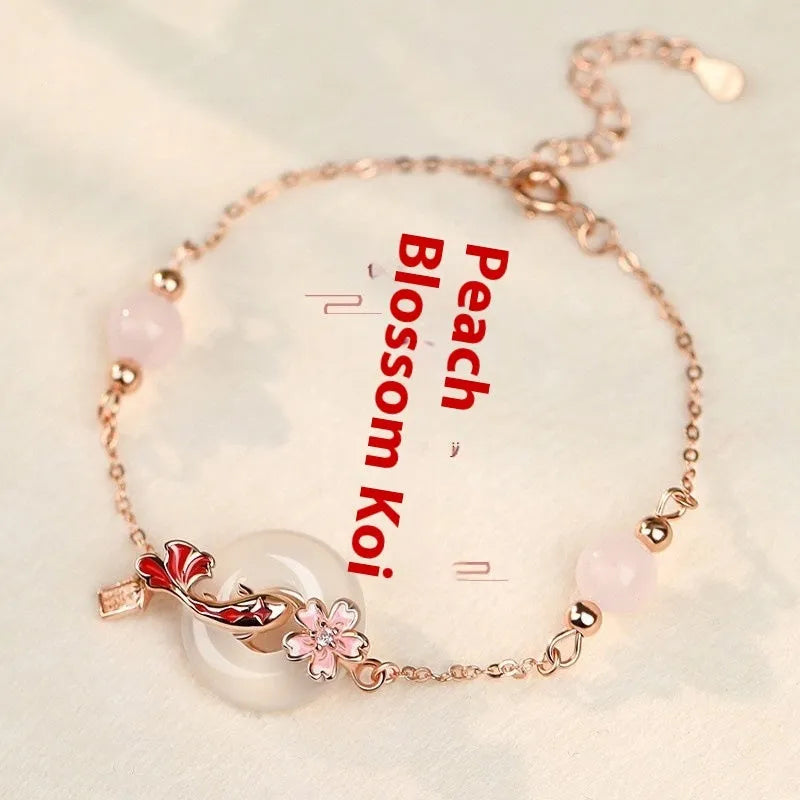 S925 sterling silver bracelet with white chalcedony crystal flower and koi charm