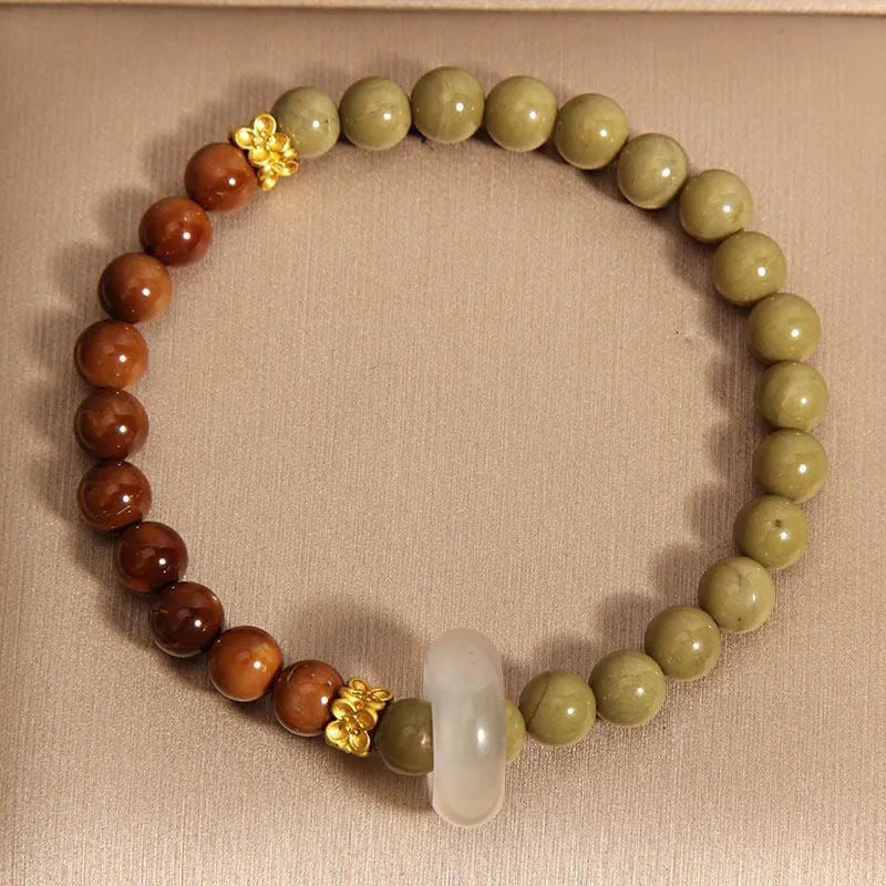 Green gradient Chinese style women's bracelet with crown and diamond motifs