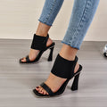 Women's high heel sandals with elastic strap in black, milky white and brown colours