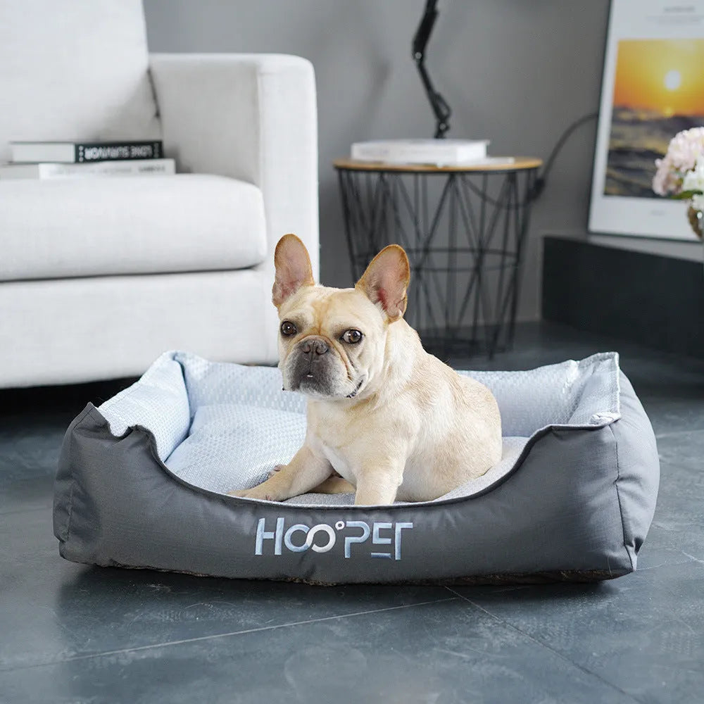 Soft grey dog bed with cat cave design and removable cover shown in small, medium, and large sizes.