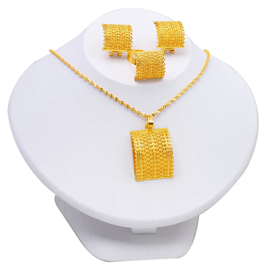 Gold-coloured copper bridal jewellery set with necklace, earrings, and ring in natural style