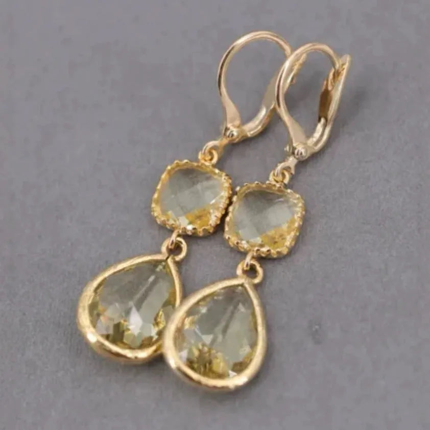 Gold geometric long fringe drop earrings with exaggerated crystal and water droplet design