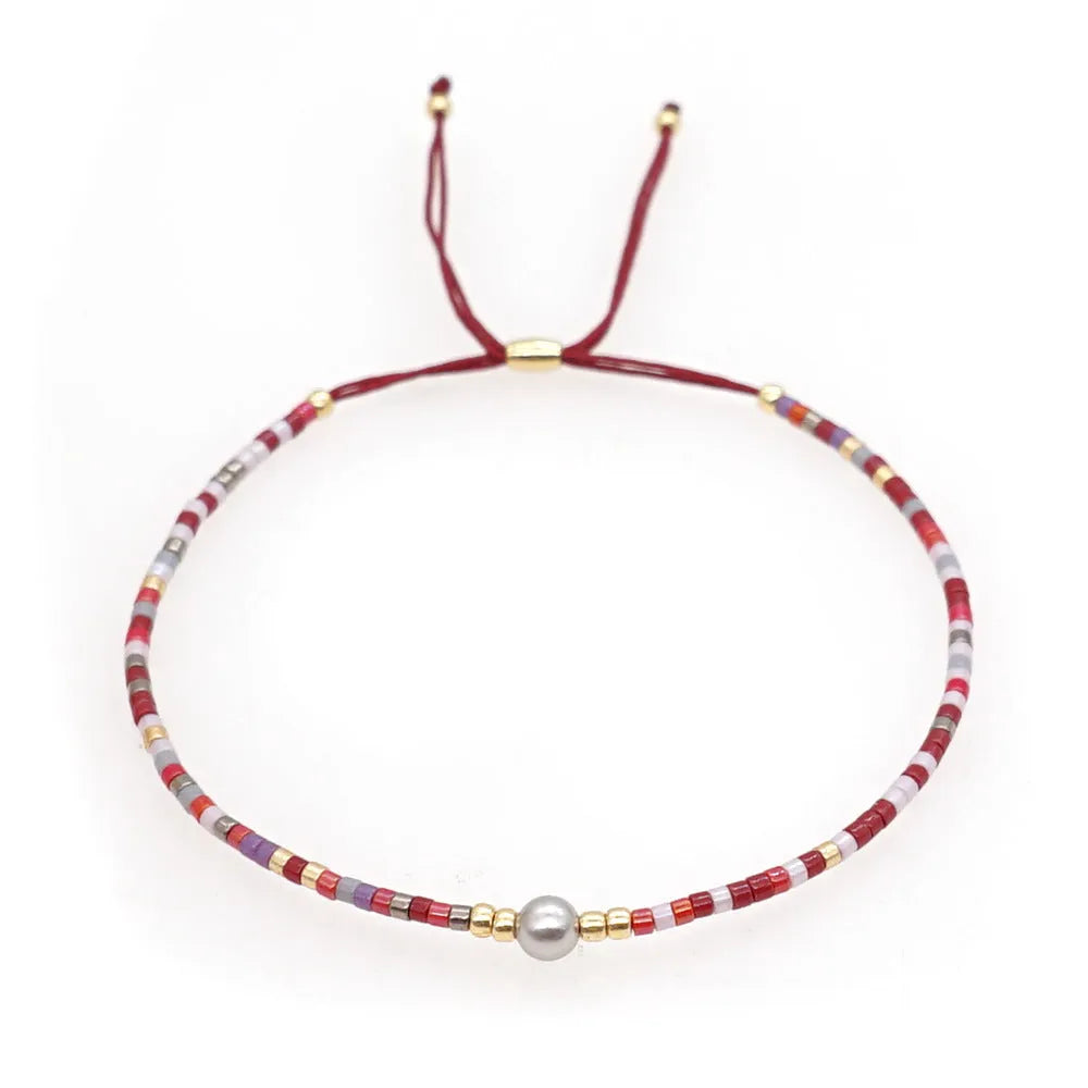 Handmade Bohemian style beaded bracelet for women with semi-precious stone and colourful glass beads