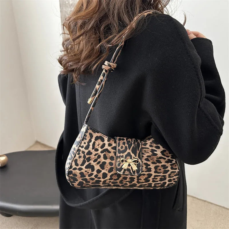 Women's casual PU leather handbag with sandwich pocket design in black, brown, coffee, or khaki colours
