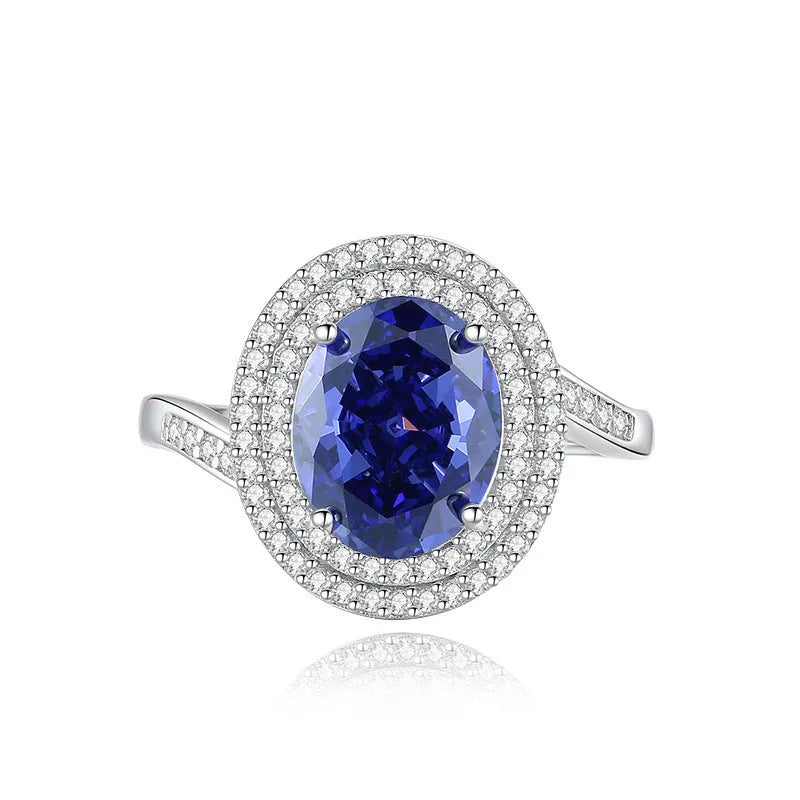 Heart-shaped sterling silver ring with a High Carbon Diamond and tan sang colour zircon stones.