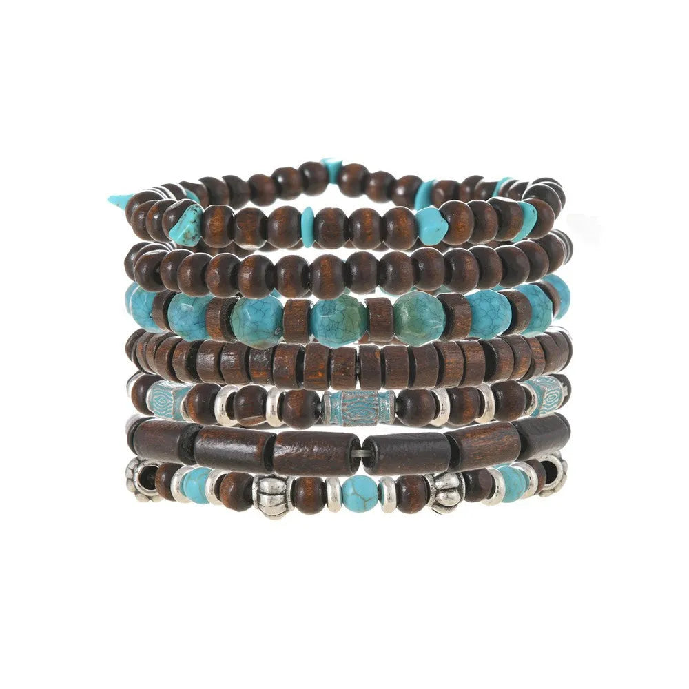 Seven multicolour wooden bead and alloy retro bracelets laid out showing round bead design