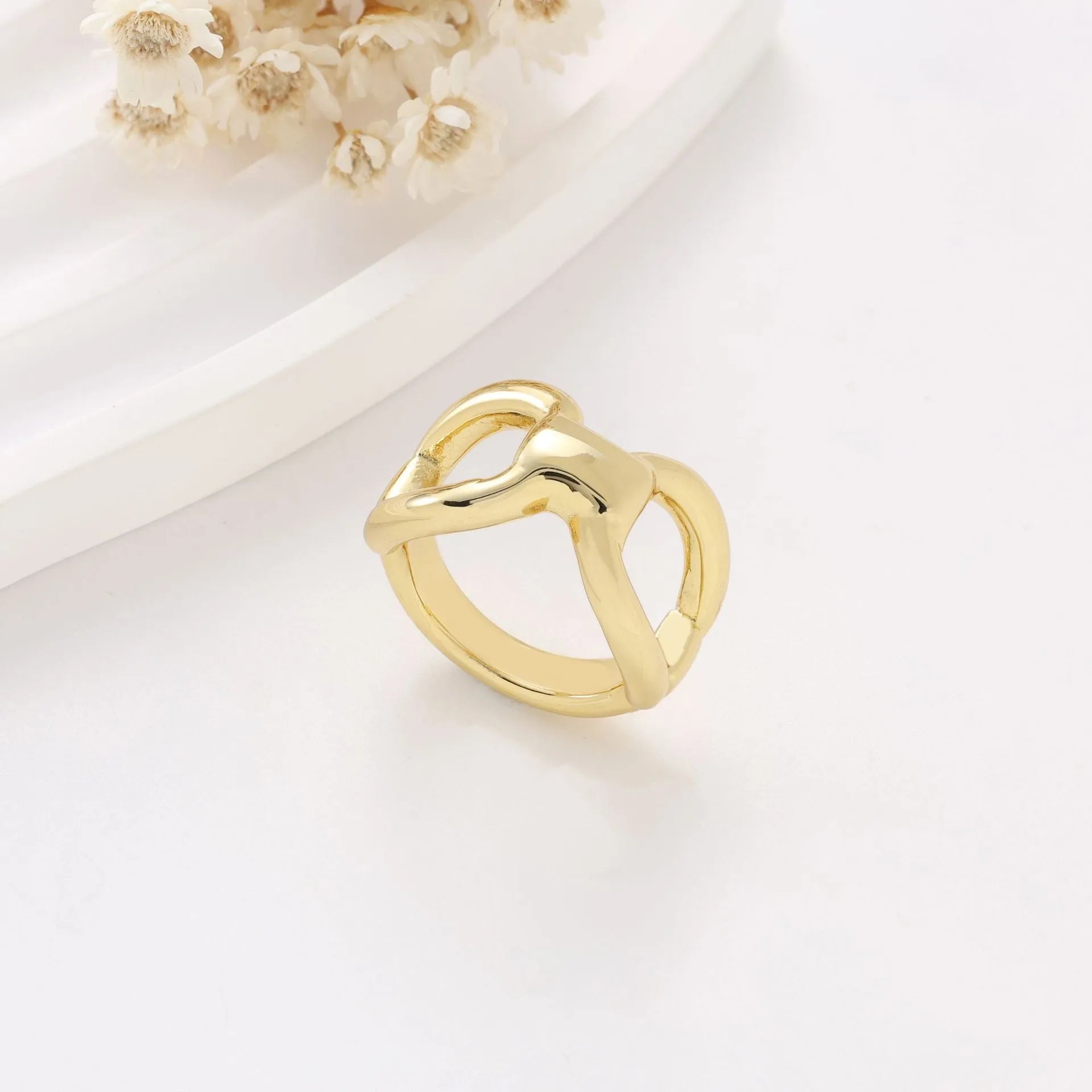 Women's titanium steel ring with butterfly hollow design and bow shape in gold colour