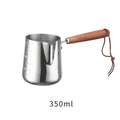 Stainless steel garland coffee cup with wooden handle and interior measurement scale.