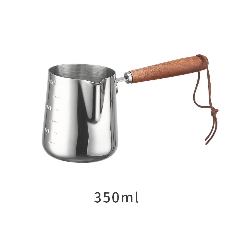 Stainless steel garland coffee cup with wooden handle and interior measurement scale.