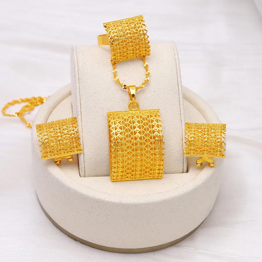 Gold-coloured copper bridal jewellery set with necklace, earrings, and ring in natural style
