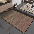 Square diatomaceous earth bathroom floor mat with a geometric American wood grain pattern in a natural wood tone.