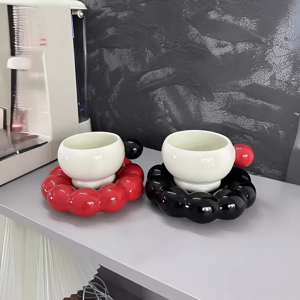 Ceramic coffee set with mug and dish in a simple Nordic style, shown in a choice of solid colours.