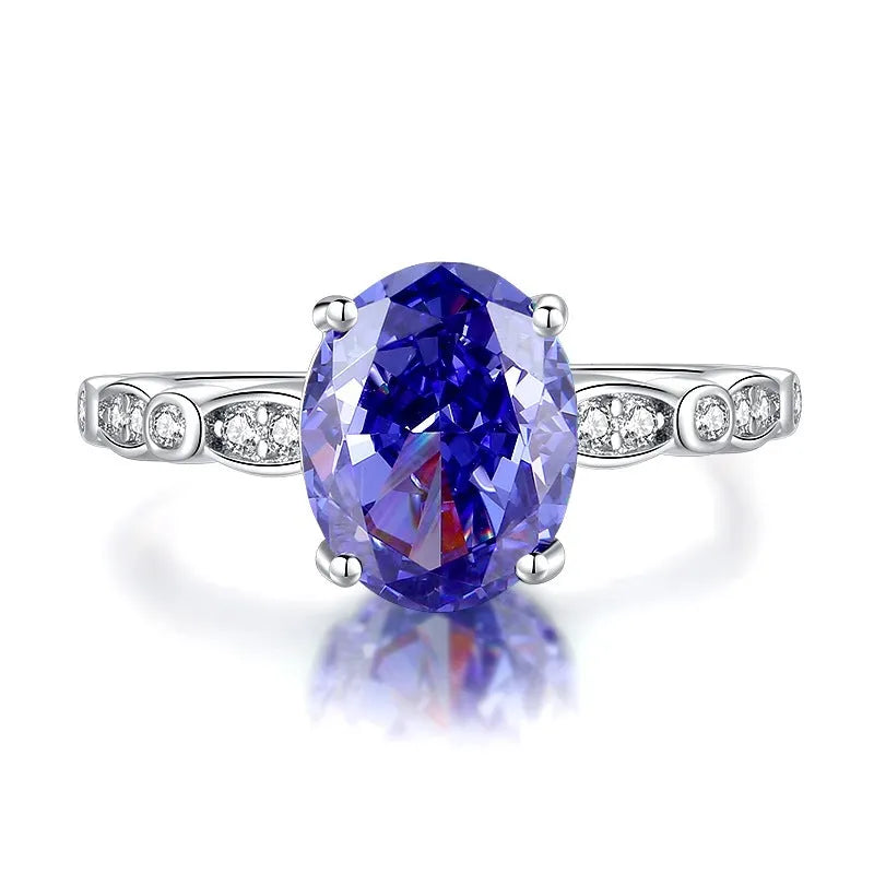 Heart-shaped sterling silver ring with a High Carbon Diamond and tan sang colour zircon stones.