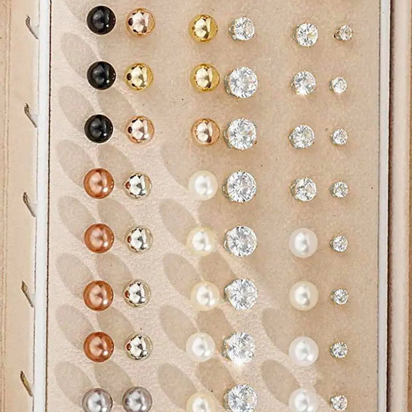108 geometric pearl earrings with round elements and gold electroplated finish displayed as bulk set