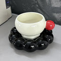 Ceramic coffee set with mug and dish in a simple Nordic style, shown in a choice of solid colours.