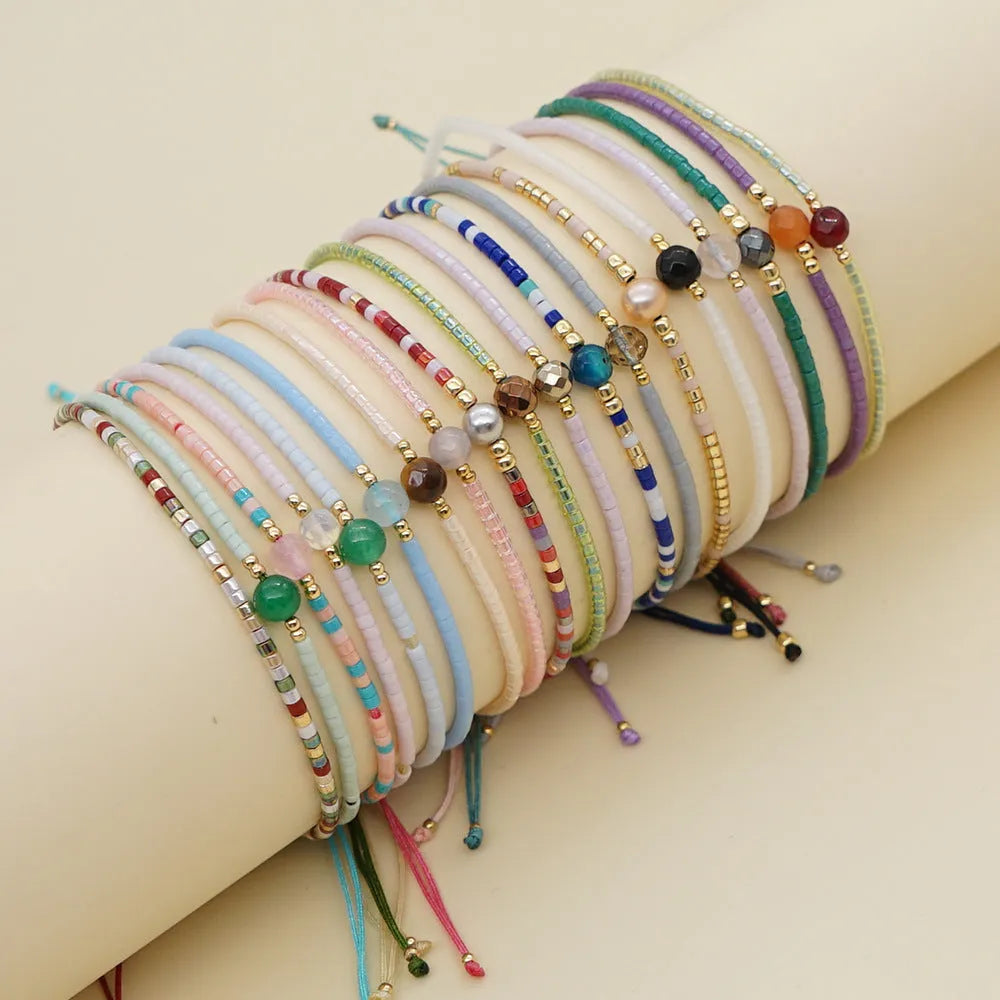 Handmade Bohemian style beaded bracelet for women with semi-precious stone and colourful glass beads