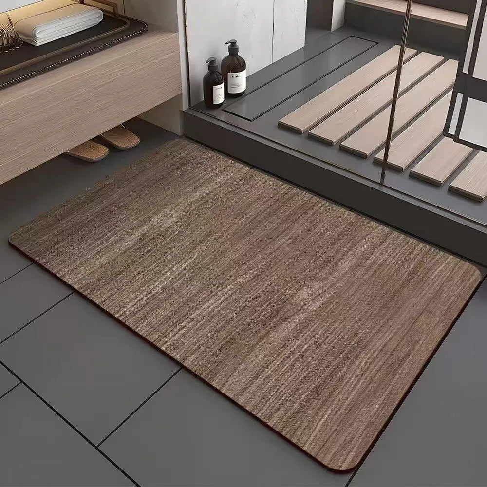 Square diatomaceous earth bathroom floor mat with a geometric American wood grain pattern in a natural wood tone.